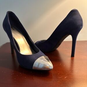 Navy suede with metallic silver tips make these shoes striking!
